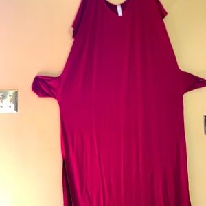 Lounger with side seam pockets. Never worn